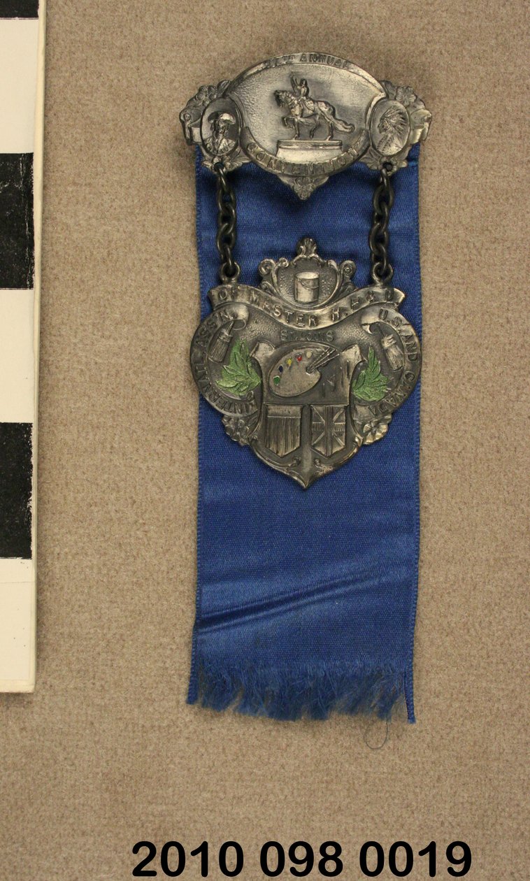 Épingle en étain avec ruban bleu de la Convention de l