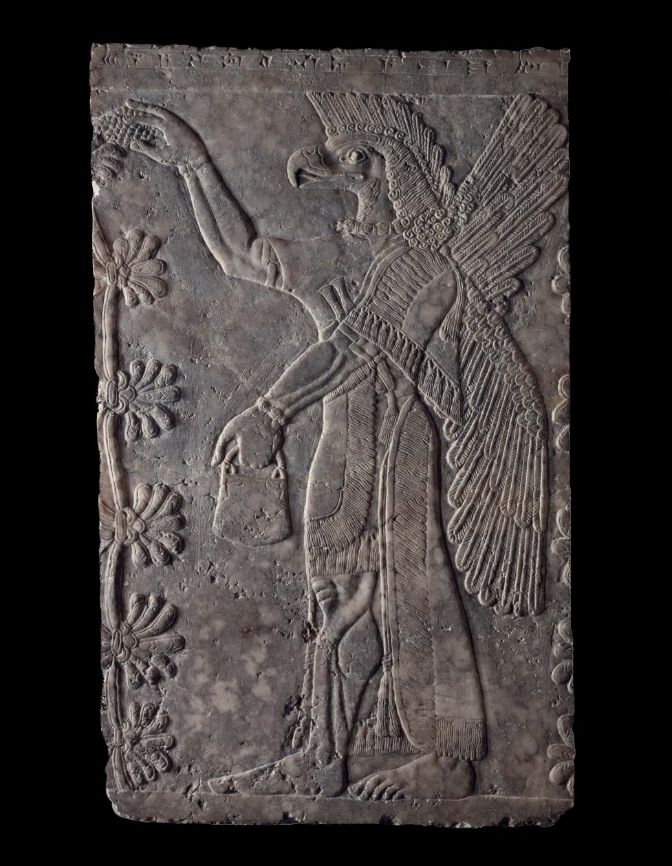 Figure ailée à tête d