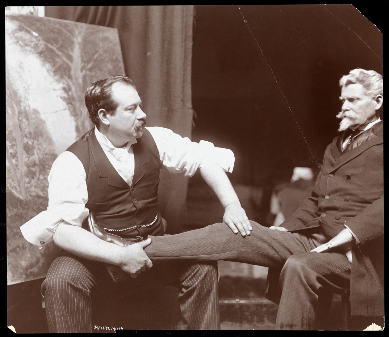 Professeur Atkinson, un rebouteux anglais, avec un patient masculin, 1898 - Byron Company