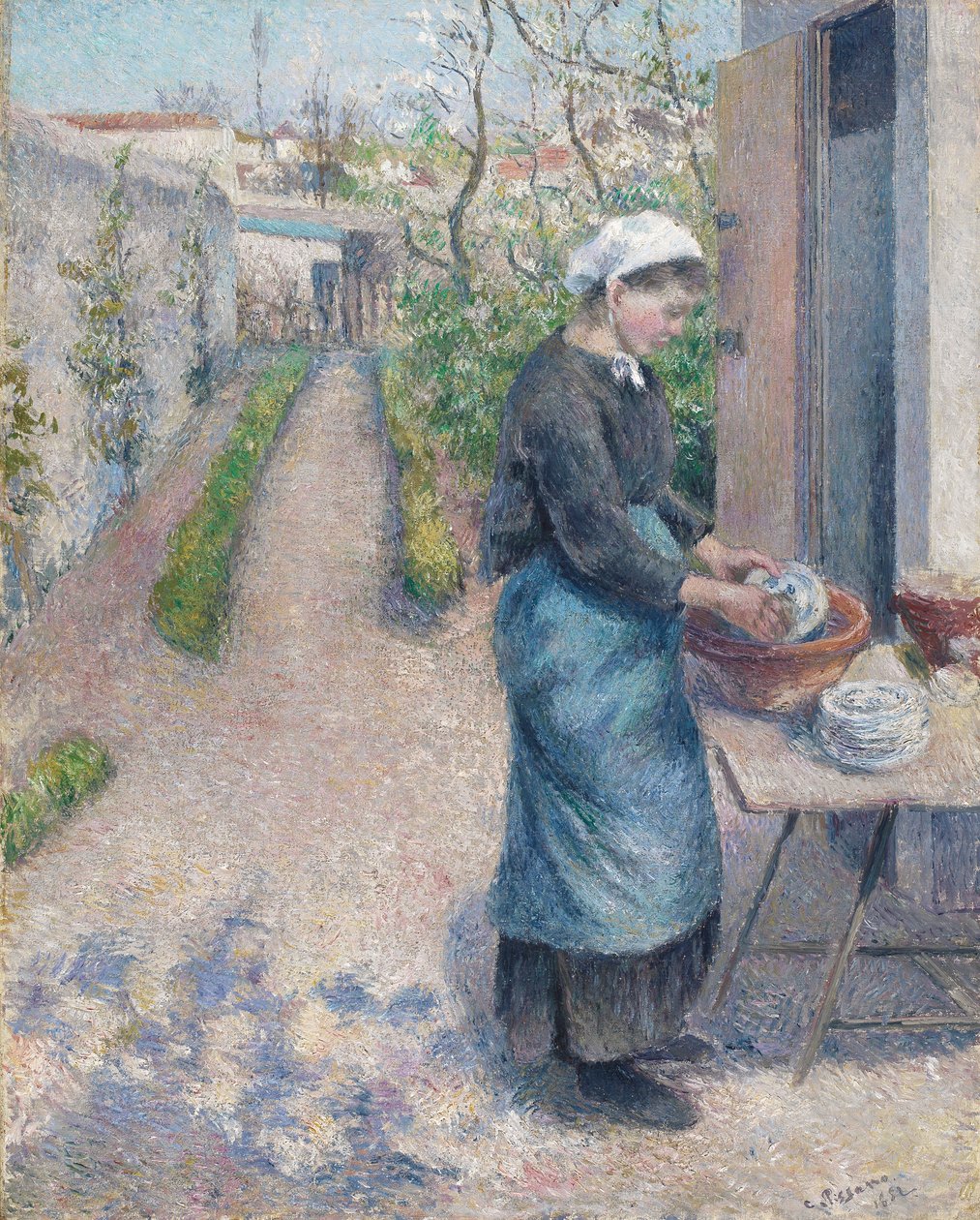 Dans le jardin à Pontoise : Une jeune femme faisant la vaisselle, 1882 - Camille Jacob Pissarro