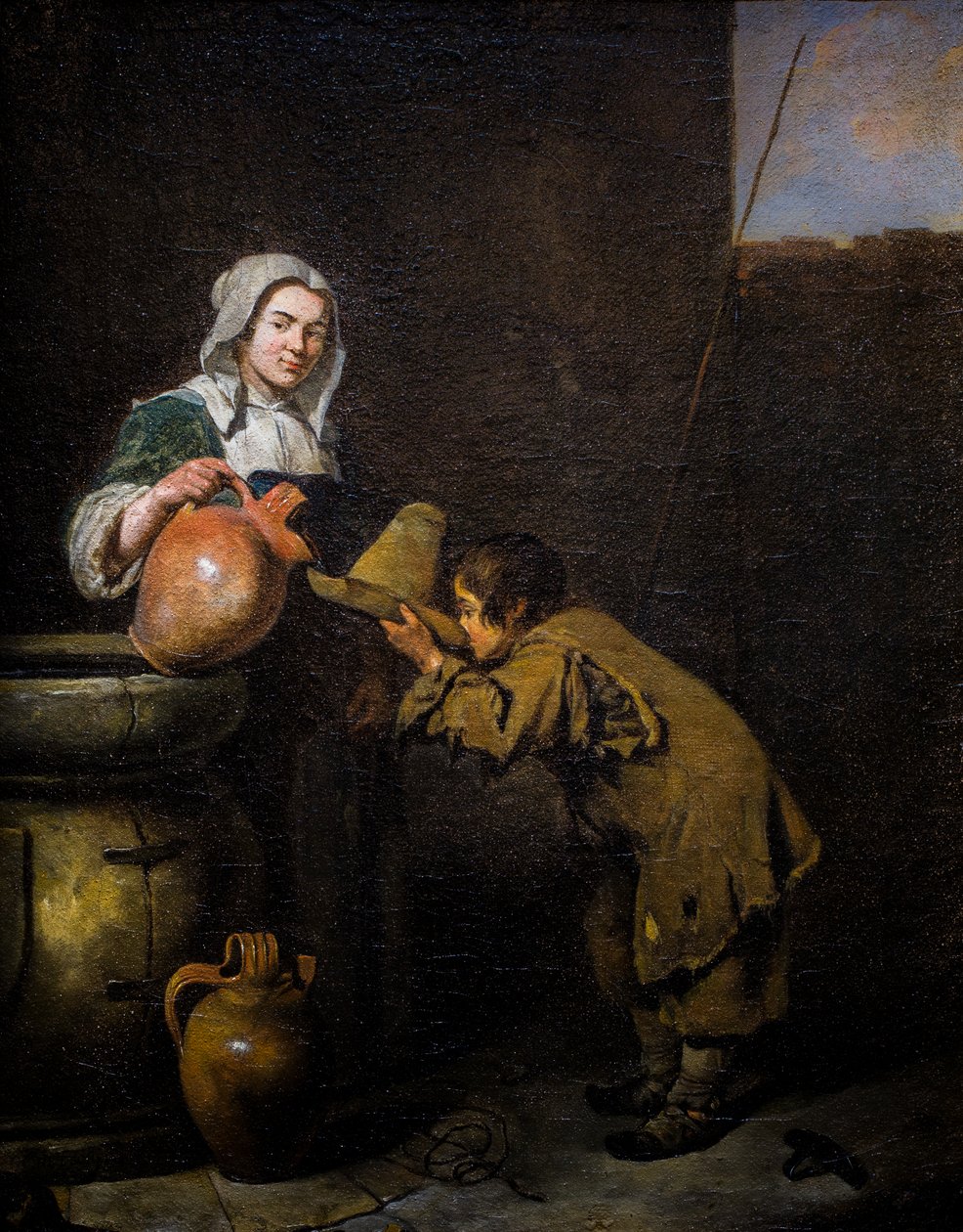 Jeune ramoneur buvant près d