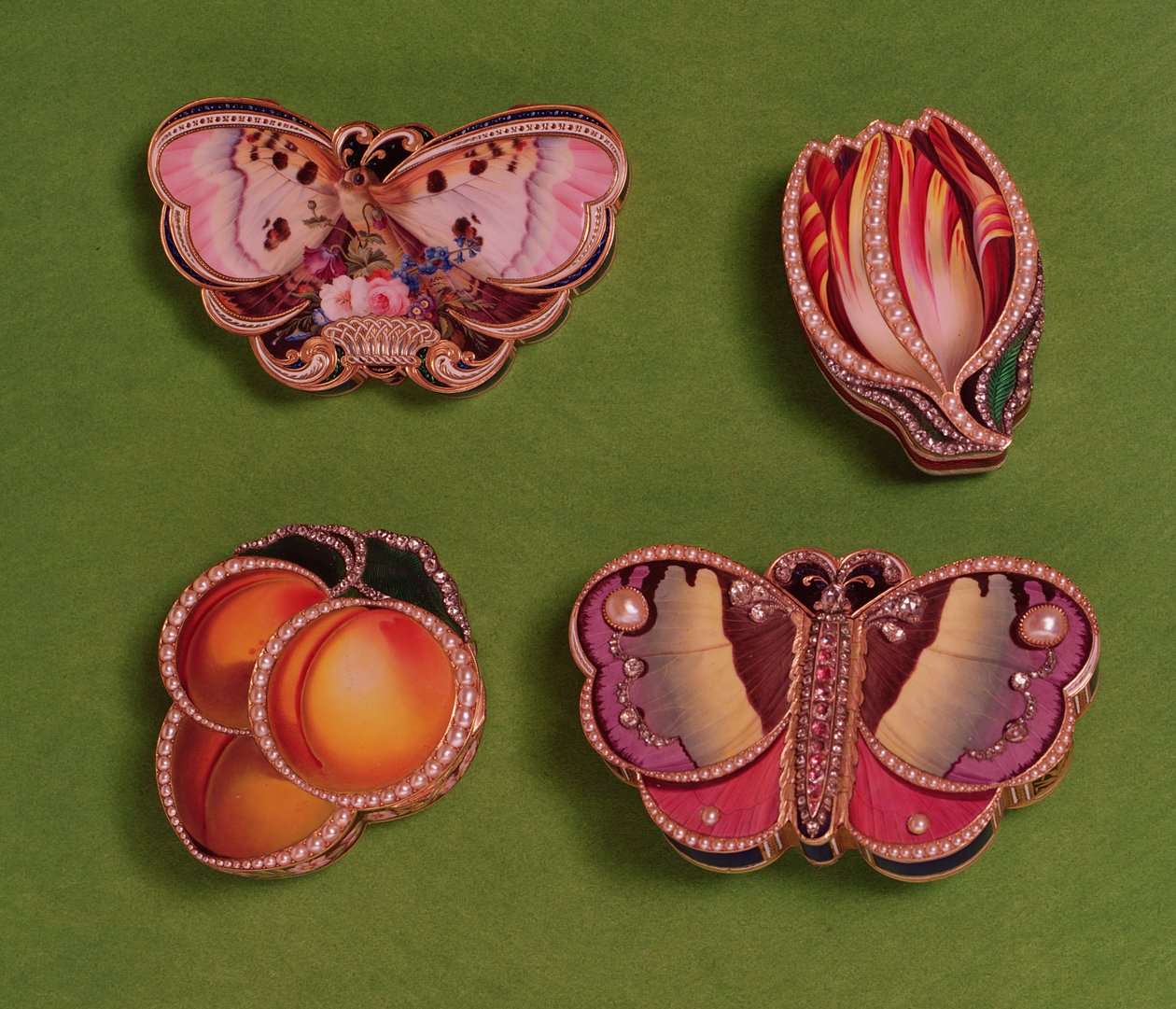 Quatre boîtes émaillées et ornées de bijoux, en forme de papillon, tulipe et pêche, milieu du 18ème siècle - French School