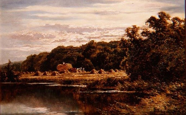 Moissonneurs dans un champ près d