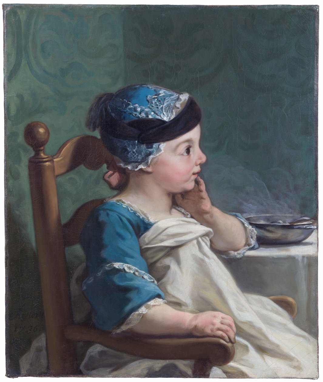 Garçon dans une chaise d