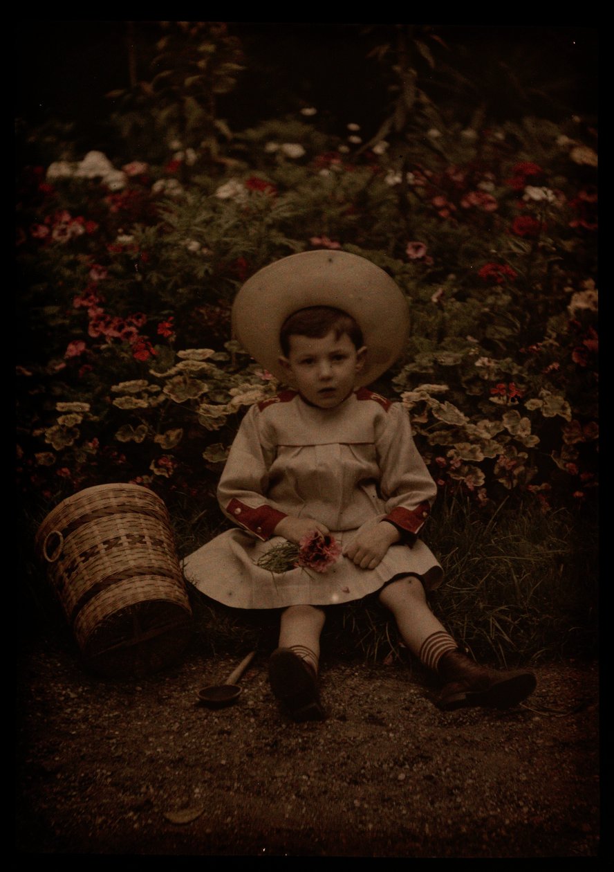 Enfant devant des fleurs - Johannes Hendrikus Antonius Maria Lutz
