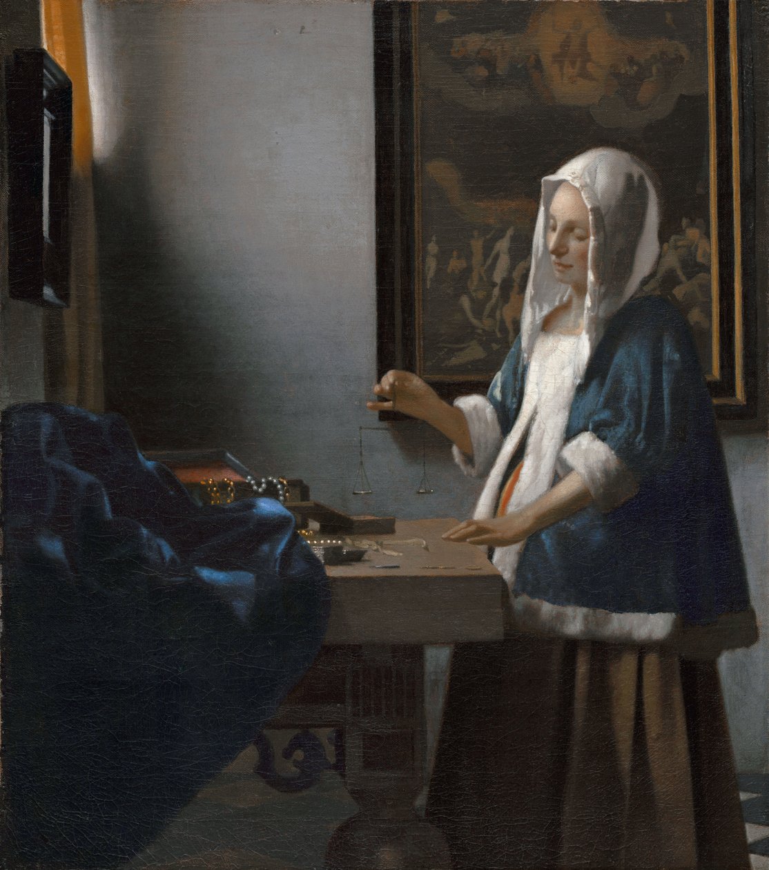 Femme tenant une balance - Johannes Vermeer