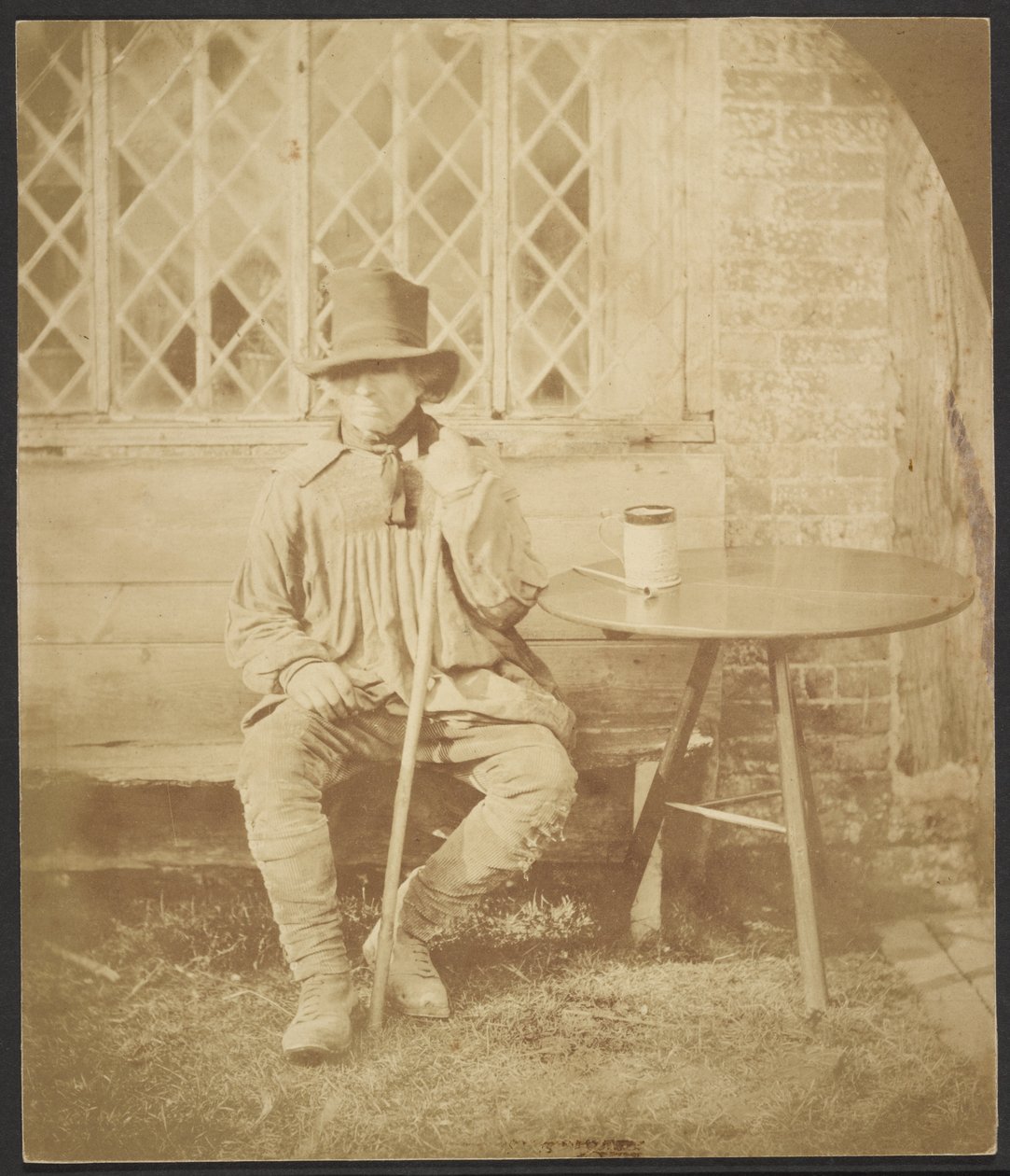 [Homme assis à une table] - John Whistler