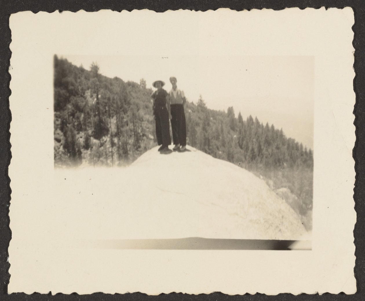 [Figures Standing on Rock] - Louis Fleckenstein