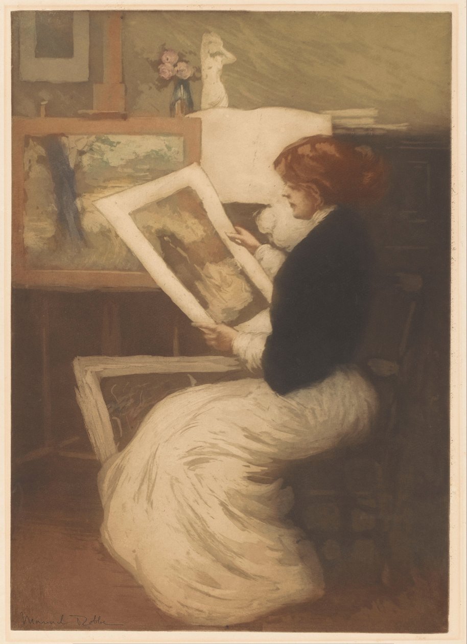 Femme regardant une estampe - Manuel Robbe