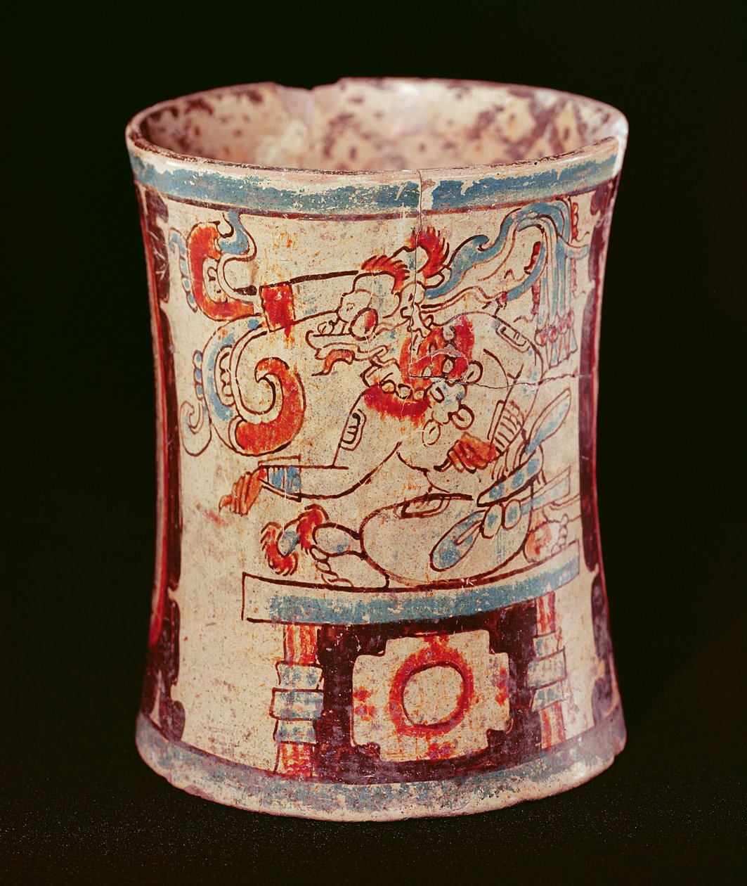 Vase cylindrique représentant une divinité avec des boucles de parole - Mayan