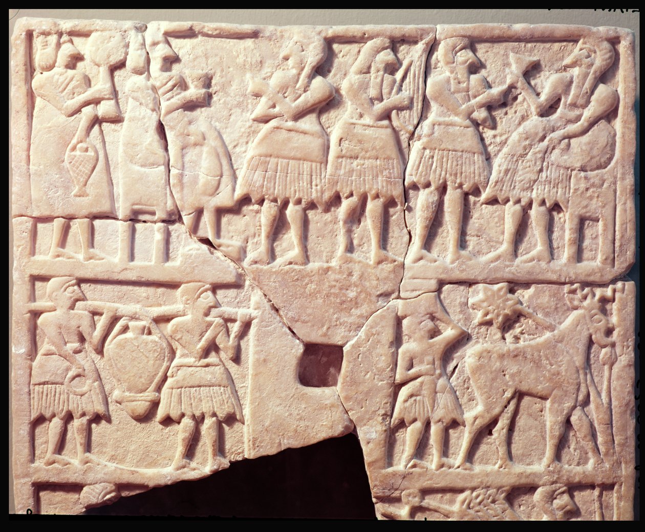 Plaque votive représentant une scène d