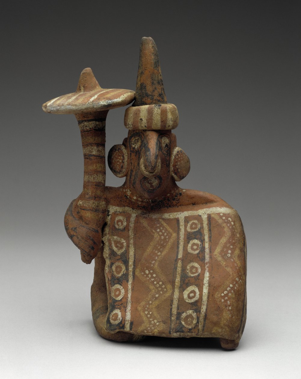 Figure masculine assise tenant une masse - Nayarit Nayarit