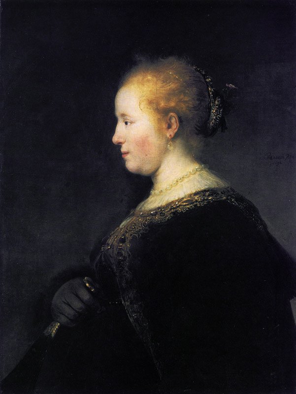 Jeune femme de profil avec un éventail - Rembrandt van Rijn