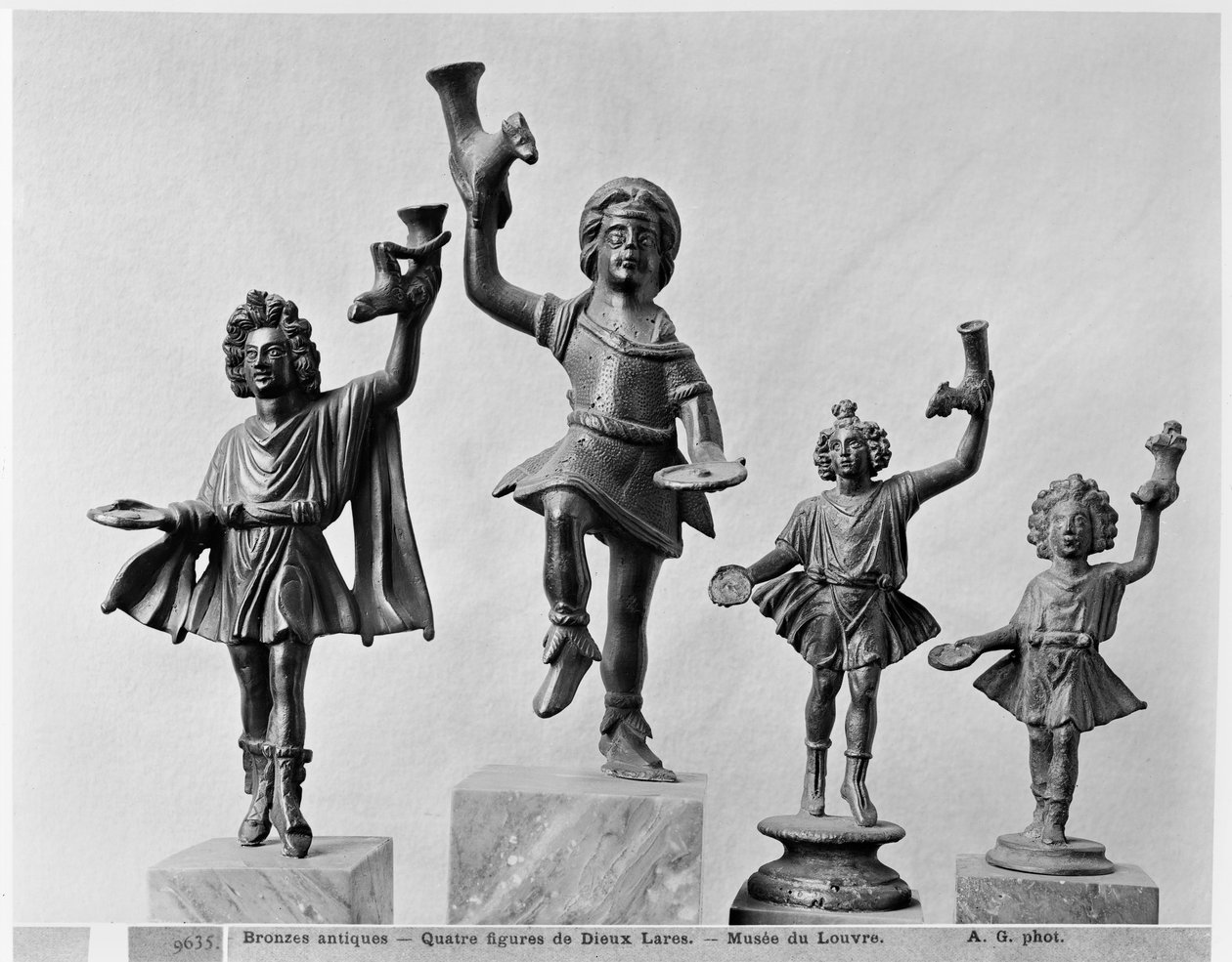 Quatre figures de Lar (bronze) - Roman