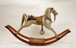 Cheval à bascule (bois et cuir)