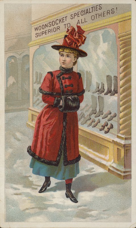 Dame faisant du lèche-vitrine sous la neige - American School