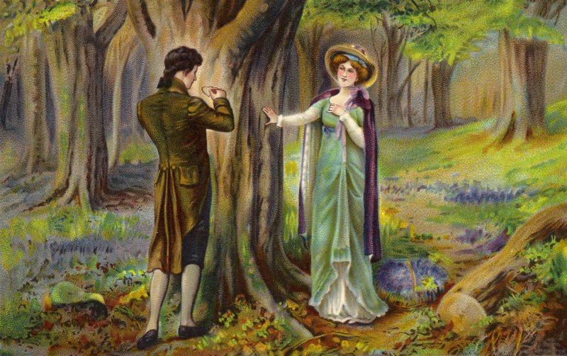 Couple gravant un cœur sur un arbre - English School